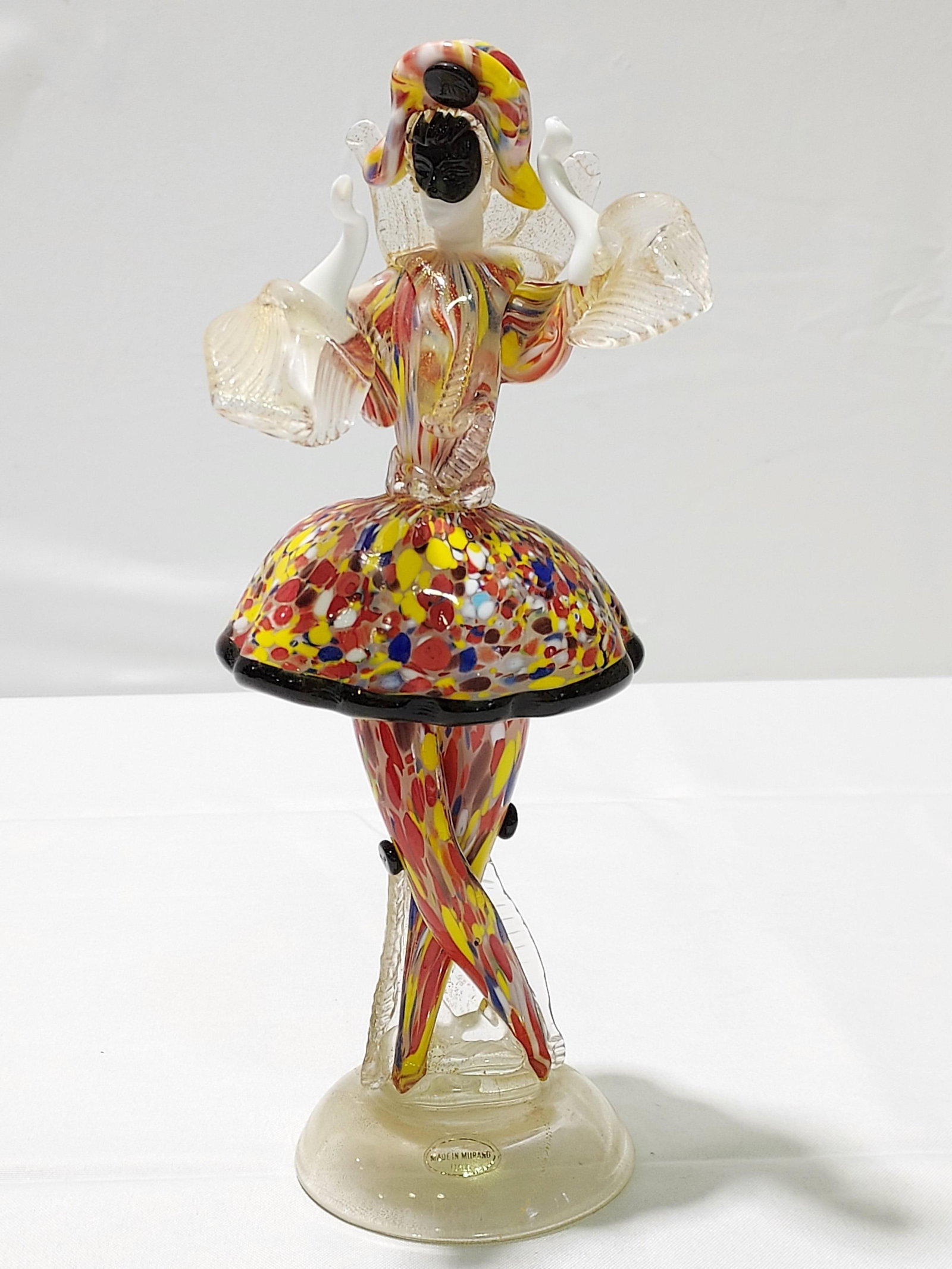 MARIO BADIOLI MURANO GLASS HARLEQUIN FIGURE 11": Mario Badioli Murano glass figure of a harlequin measuring 11.5" tall. Signed on base. Condition: good, no damages, see images. Weight: 1.8 lbs.