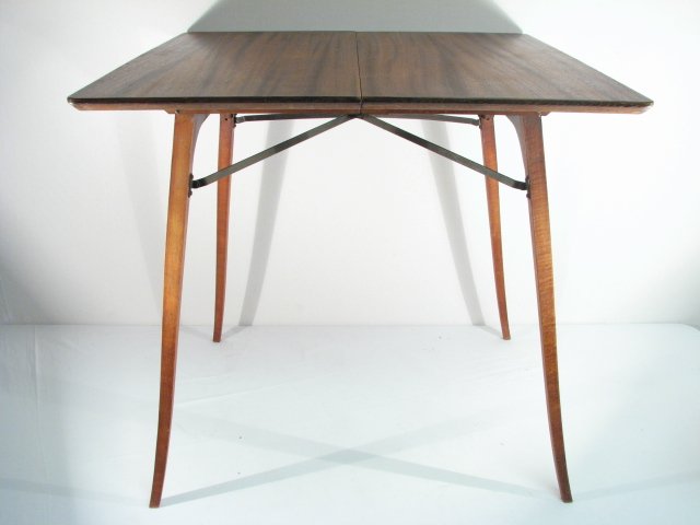 WOODEN FOLDING CARD TABLE: A wooden folding side/card table with a mahogany finish. Condition: very minor wear to finish, see images. Measures 28" tall x 29.5" wide x 29.5" deep. Measures 37" tall x 5.5" deep when folded. Shipp