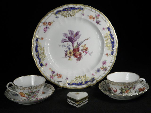 CONTINENTAL FLORAL HAND PAINTED PORCELAIN: 6 PCS: Lot of six pieces of continental porcelain. Includes: a small French gilt porcelain brass mounted pill box, a KPM German floral porcelain 9" plate, and (2) sets of Dresden hand painted cups and saucer