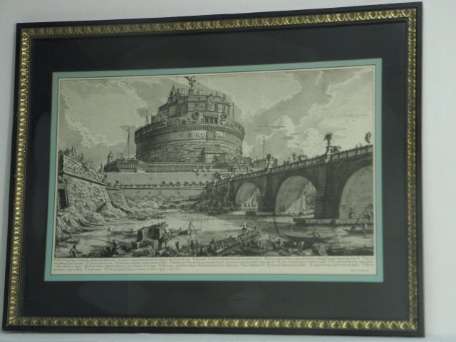 ETCHING AFTER GIOVANNI BATTISTA PIRANESI: "VEDUTA : Etching after Italian artist Giovanni Battista Piranesi. "Veduta del Ponte, e del Mausoleo fabbricati da Elio Adriano, Imp....". From the "Le Antichita Romane" series. Framed, matted, and under glass 