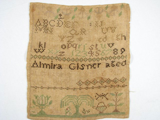 EARLY 19TH C ALPHABET & NUMBER NEEDLEPOINT SAMPLER: Early 19th century alphabet needlepoint sampler. Front reads "Almira Gisner aged 9 years April 6 NY ack 8129" with alphabet and number line above and small landscape scene below. Condition: minor disc
