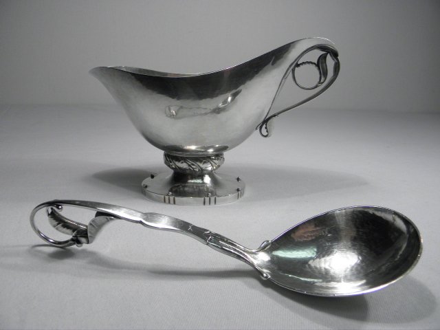 GEORG JENSEN "BLOSSOM" STERLING SILVER GRAVY BOAT : Georg Jensen sterling silver gravy boat and ladle in the "Blossom" pattern. Both pieces are marked on underside "Georg Jensen Denmark Sterling". Ladle is also marked with a stylized "J" near maker's m