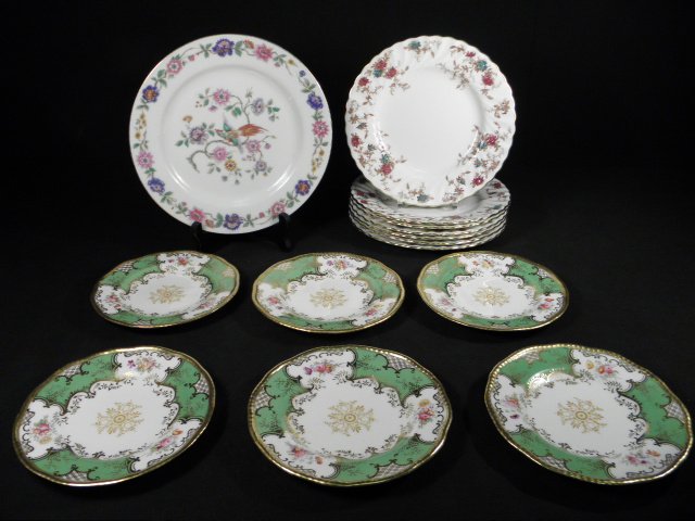 FLORAL PORCELAIN PLATES: MINTON, COALPORT, ETC 14p: Lot of fourteen assorted floral porcelain plates. Includes (7) 7.8" floral plates by Minton, (1) 8.75" Limoges plate by Jean Pouyat, and (6) 6" bread plates by Coalport. All pieces are marked accordin