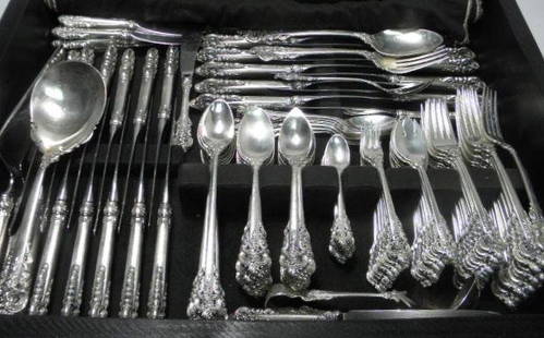 WALLACE STERLING SILVER FLATWARE SERVICE FOR TWELV: Wallace sterling silver flatware service for twelve in the "Grand Baroque" pattern. Includes 148 pieces total: twelve of each of the following: 8.85" long dinner knife, 9.35" steak knife, 6.15" butter