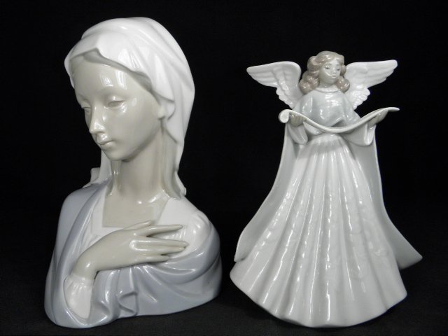 TWO LLADRO PORCELAIN FIGURINES: MADONNA & ANGEL: Lot of two Lladro Spanish porcelain figurines. Includes an 8.5" Madonna bust, and a 7" tall "Angel with Sheet Music" #5875. Both pieces marked on base with blue "Lladro" maker's mark. Condition: good,
