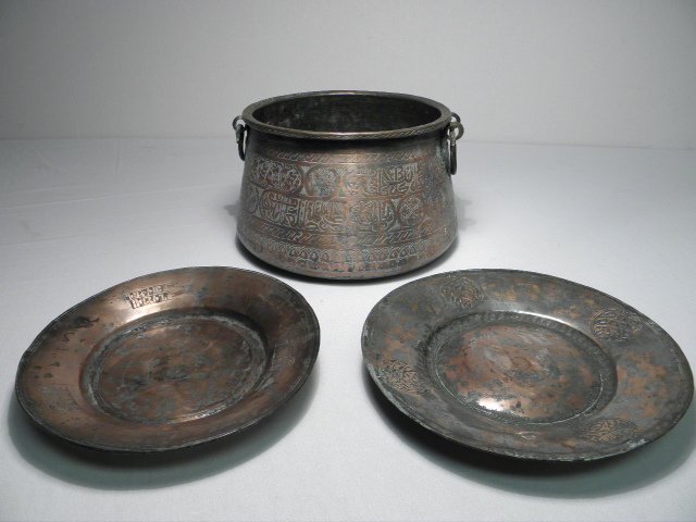 19TH C MIDDLE EASTERN COPPERWARE: OTTOMAN & ARMENI: Lot of three pieces of 19th century Middle Eastern copperware. Includes a 19th century Ottoman Empire hand wrought copper 10" plate and handled pot, and a 19th century armenian hand wrought copper 9.2