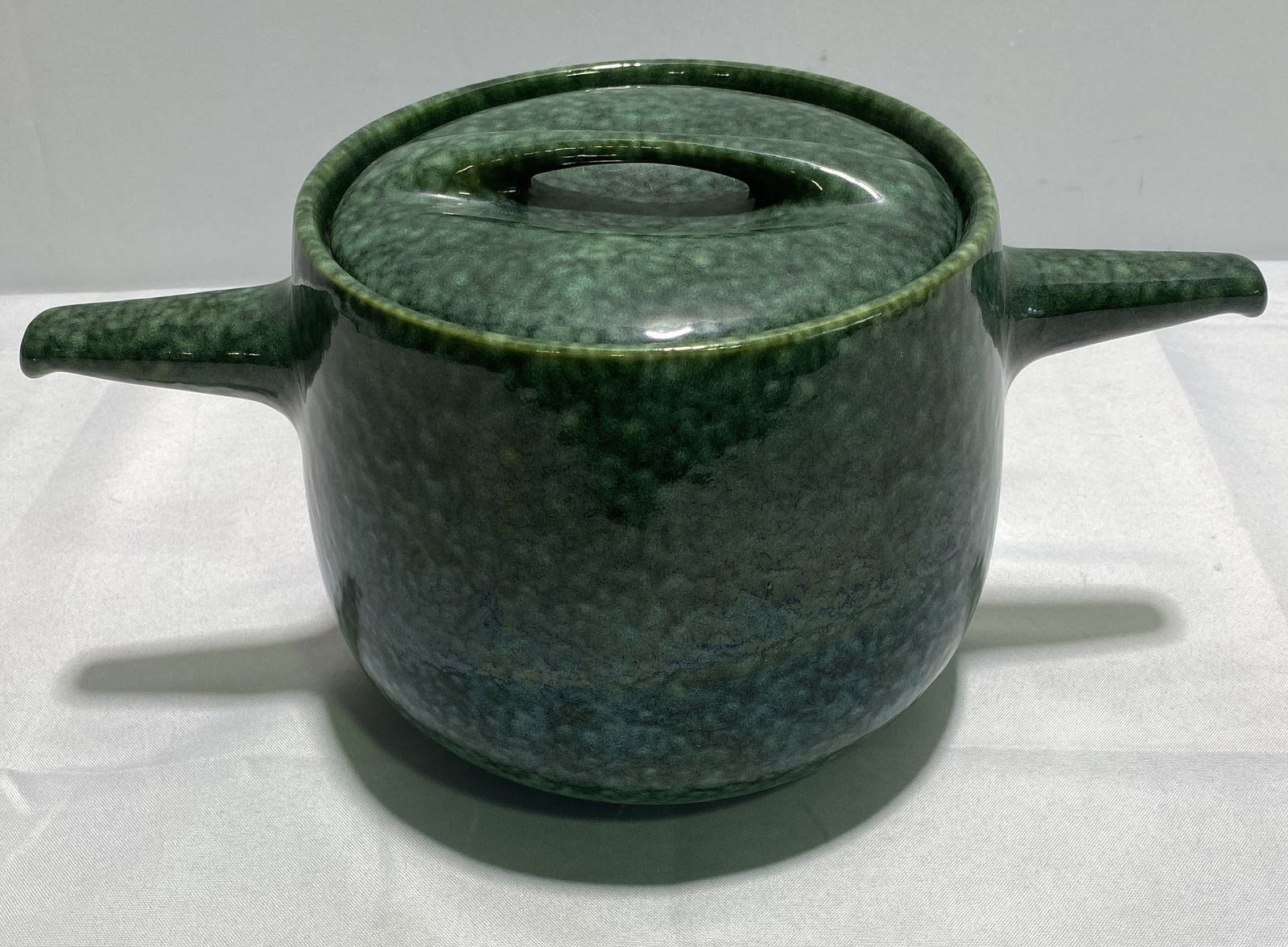 RAYMOR FOR ROSEVILLE POTTERY: FROG SKIN TUREEN: Raymor for Roseville pottery: Frog Skin finish clay tureen measuring 8" tall x a total of 16" wide. Signed on base. Condition: good, no chips or cracks, see images. Weight: 5.5 lbs.