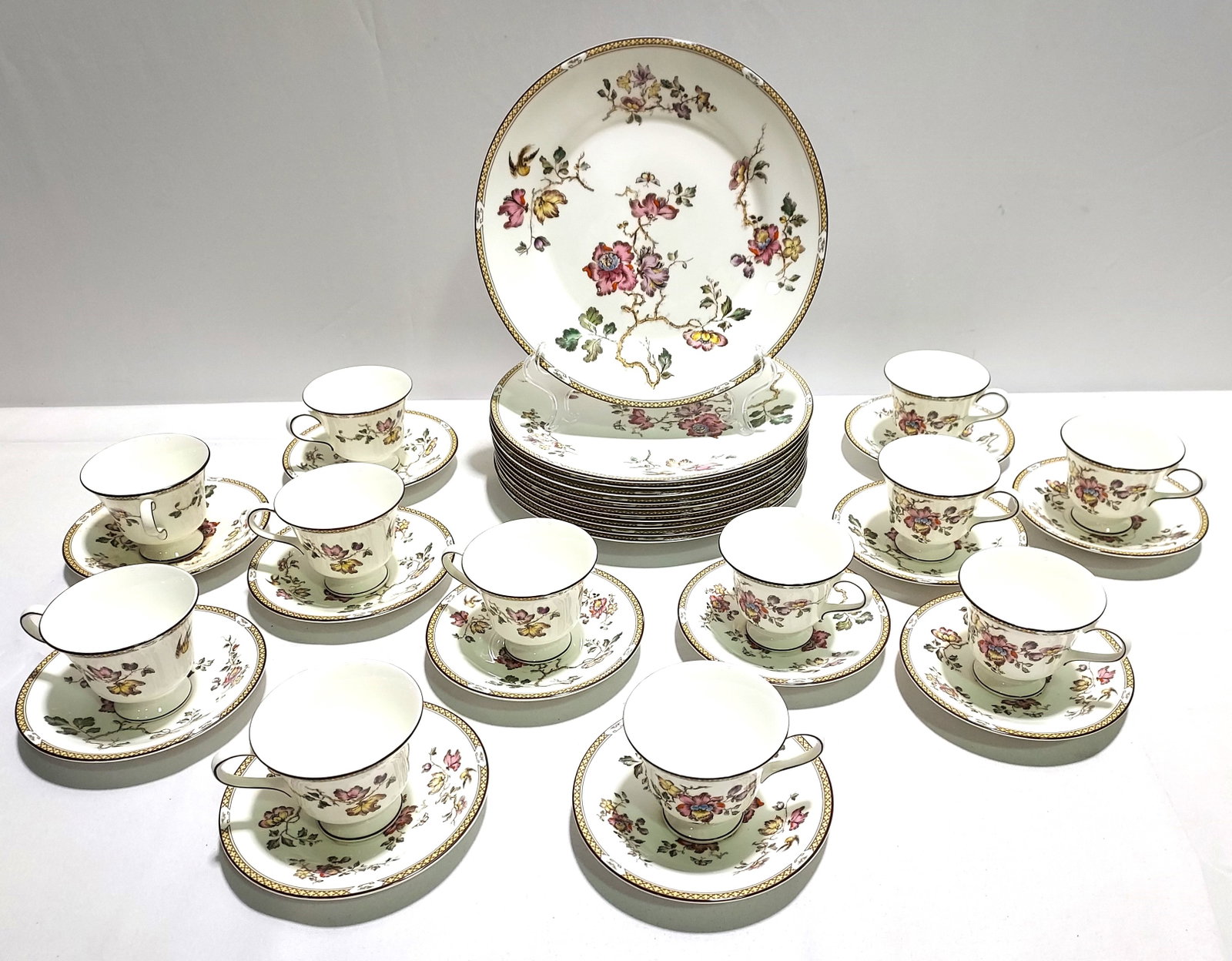 35 PC. WEDGEWOOD "SWALLOW" DINNERWARE: 35 piece Wedgewood "Swallow" Dinnerware. Wedgewood Bone China Made in England "Swallow". Includes: 11 pcs. Dinner Plates-11" dia., 12 pcs. Saucers-6" dia., 12 pcs. Tea/Coffee Cups- 3.75" dia. x 3" h. 