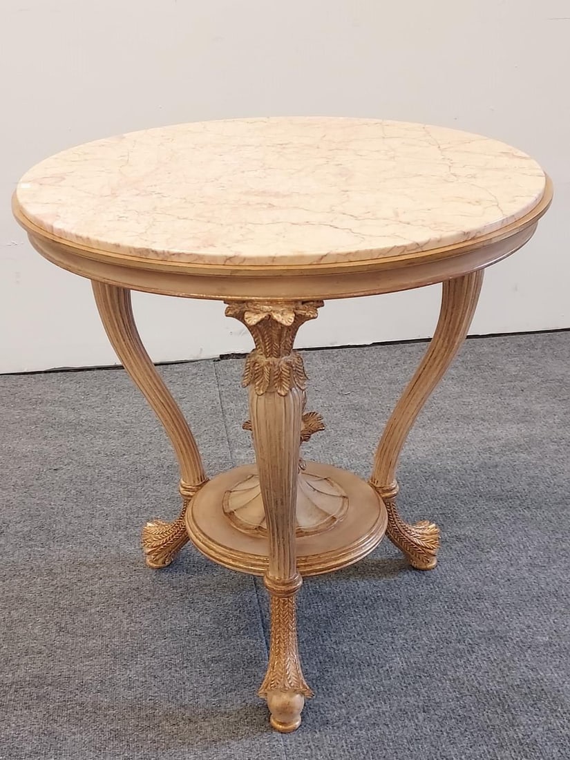 VINTAGE ITALIAN MARBLE TOP OCCASIONAL TABLE: Vintage Italian gold toned marble top occasional table. Measures 29" tall x 29.5" diameter. Marked on the base "Made in Italy". Condition: good, no damages, see images. Weight: approx. 75 lbs.