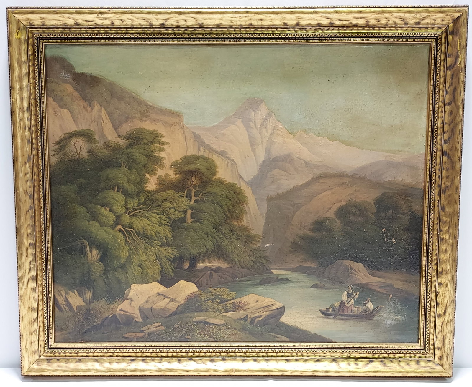 ANTIQUE GERMAN OIL ON CANVAS PAINTING: UNBEKANNT: Antique German oil on canvas painting depicting a mountainous scene with two figures in a small boat. Unsigned on the front. Signed on the back of canvas with what appears to read "Unbekannt". Measure