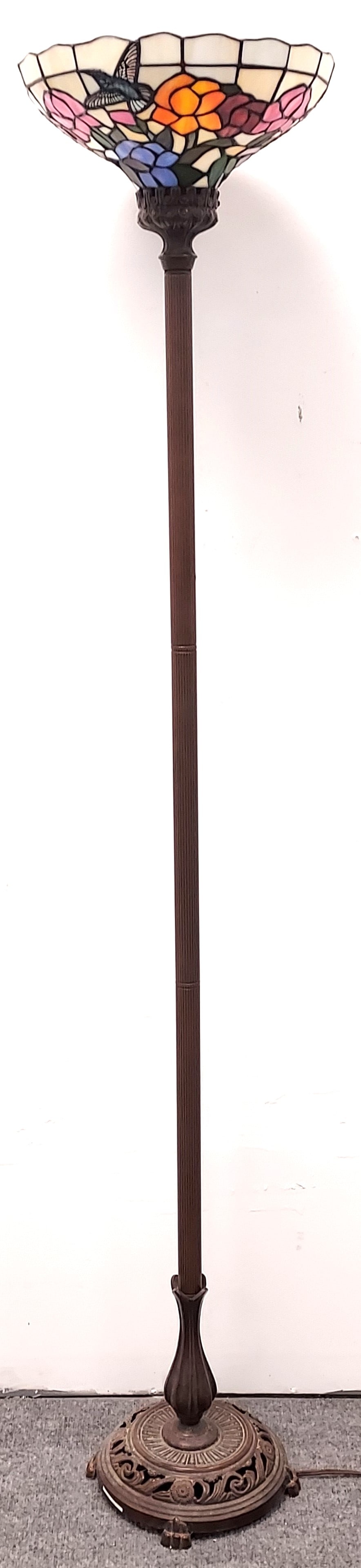 STAINED / LEADED GLASS TORCHIERE STYLE FLOOR LAMP: Stained / leaded glass torchiere style floor lamp measuring a total of 70.5" tall x 13.75" diameter at the shade. Condition: currently working, finish may show minor signs of normal use, see images. W