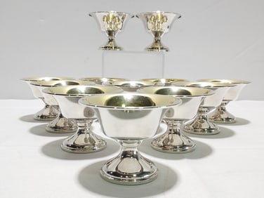 TWELVE WEIGHTED STERLING SILVER DESSERT CUPS