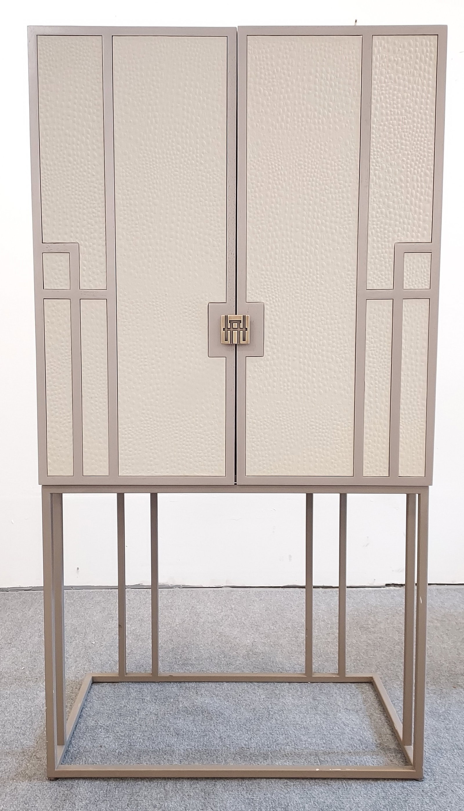 ADRIANA HOYOS "BOLERO BAR 100" BAR CABINET: Adriana Hoyos "Bolero Bar 100" bar cabinet measuring 67.25" tall x 35.5" wide and 21" deep. Condition: good with only very minor signs of normal use, see images. Weight: approx. 80-100 lbs.
