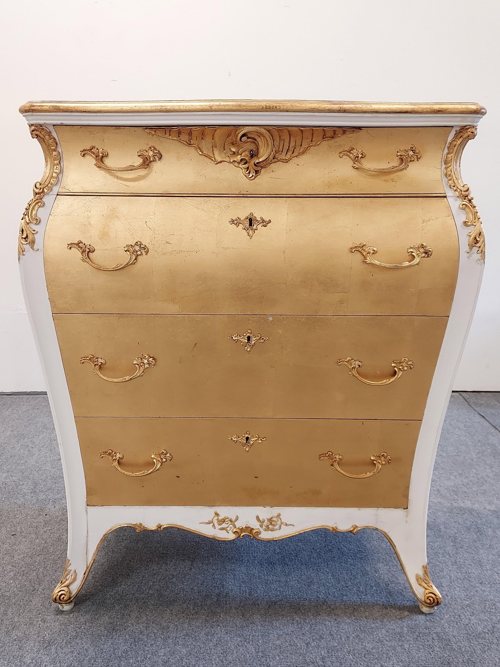 CUSTOM WHITE & GOLD PAINTED LOUIS XV STYLE CHEST: Custom finished white and gold tone painted Louis XV style chest of drawers. Measures a total of 44.25" tall x 22" deep and 37" wide. Condition: minor scattered nicks and scuffs to finish, two of the 