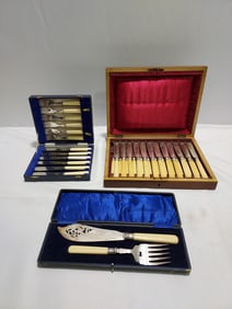 THREE ANTIQUE BOXED FISH SERVING SETS