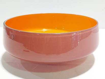RODOLFO DORDONI FOR VENINI BOWL: Rodolfo Dordoni for Venini pink and orange bowl: dyed glass with antique rose pink exterior and orange interior. Wide projecting body with slightly tapered wall and low cylindrical stand. Engraved "Ve