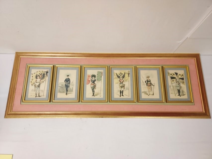 ALF COOKE LEEDS CHROMOLITHOGRAPHS: ARMY & NAVY..: Set of chromolithographs all framed together in a single frame, Published by Alf Cooke Leeds, depicting costumes and dancers in the Army & Navy Ballet at the Alhambra Theatre, London or in this case, 