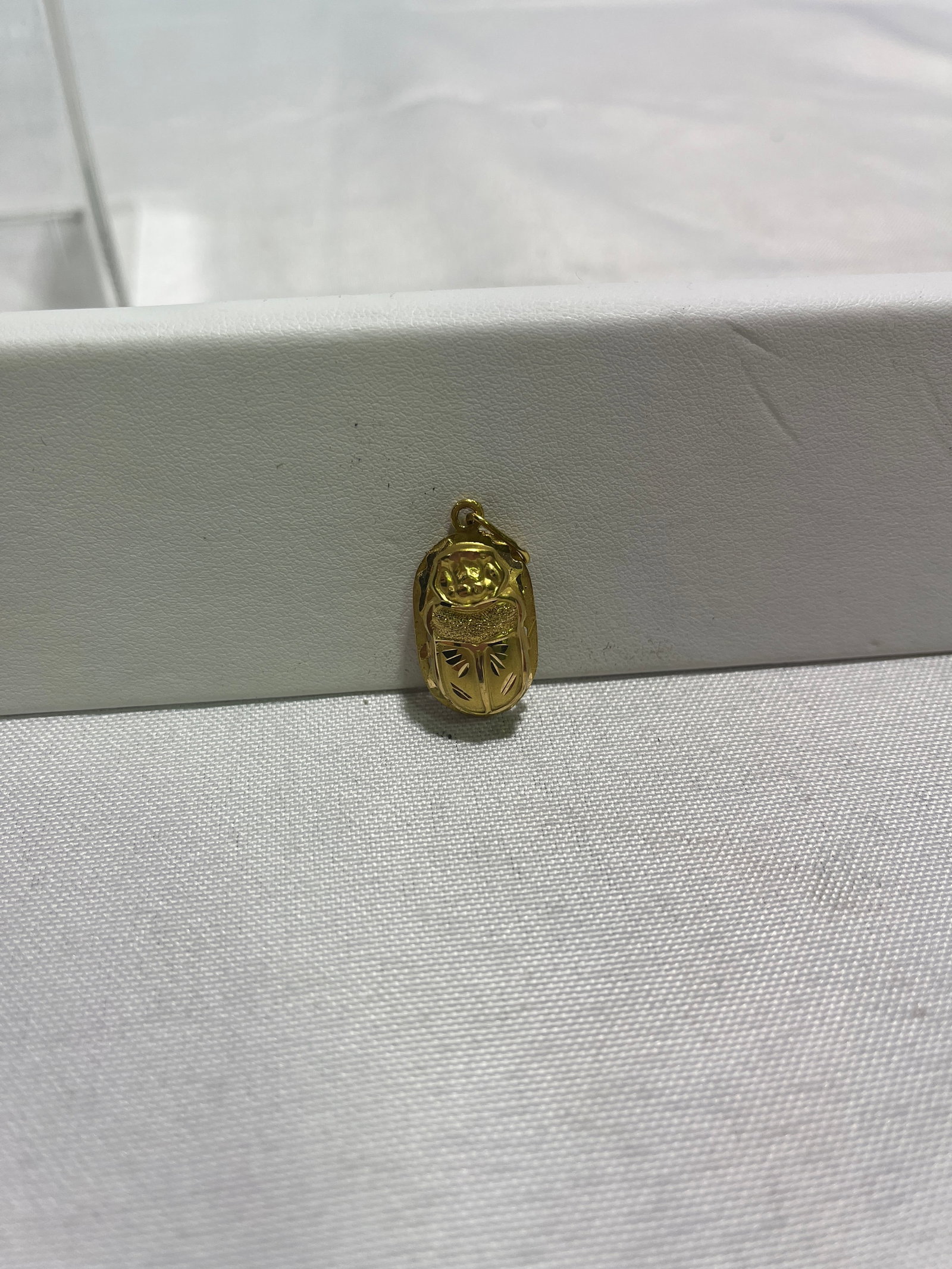 HJ206 14k yg scarab pendant/charm: 14k yellow gold scarab pendant/charm. Approx. dimensions 1.35" tall, 0.5" wide. 2.5 DWTS
