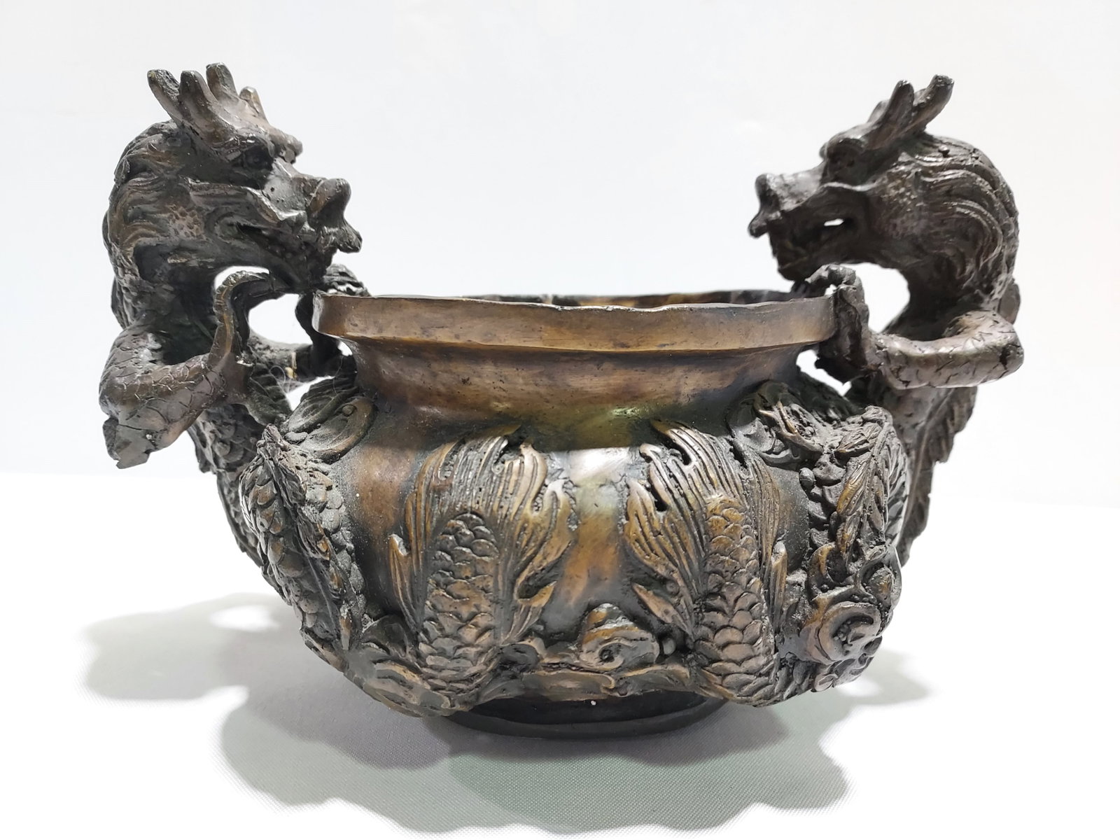 H9 Jananese bronze censer with two dragons: A bronze censer with two dragons and a demon mask. 20th C Reproduction from the Sukothai art period of 13th century Thailand. 7" x 10" x 7.5"