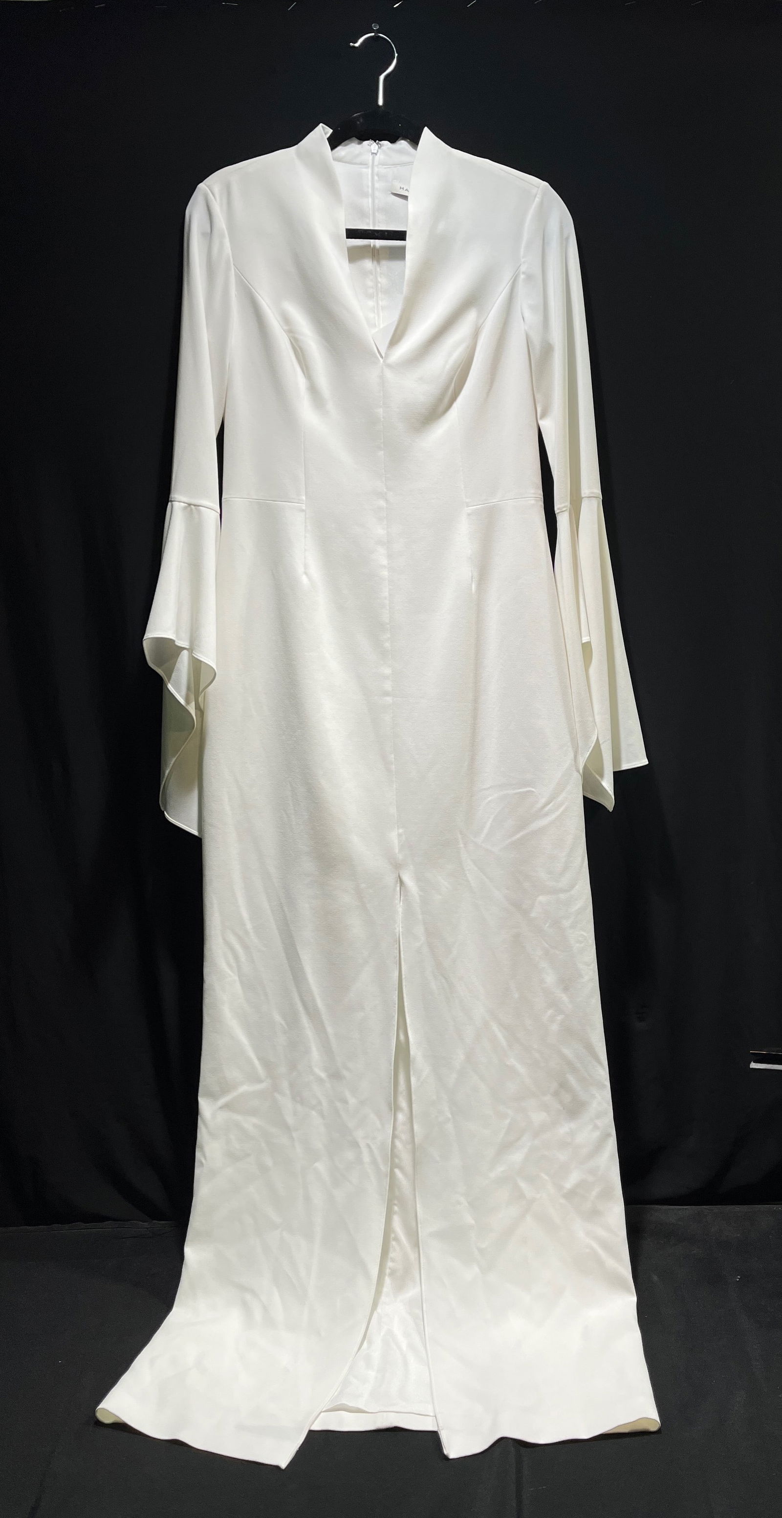 H1204 Halston Gown: Halston Gown: beige colored long sleeve gown with high front slit and flutter sleeves, New with tags, Size 6