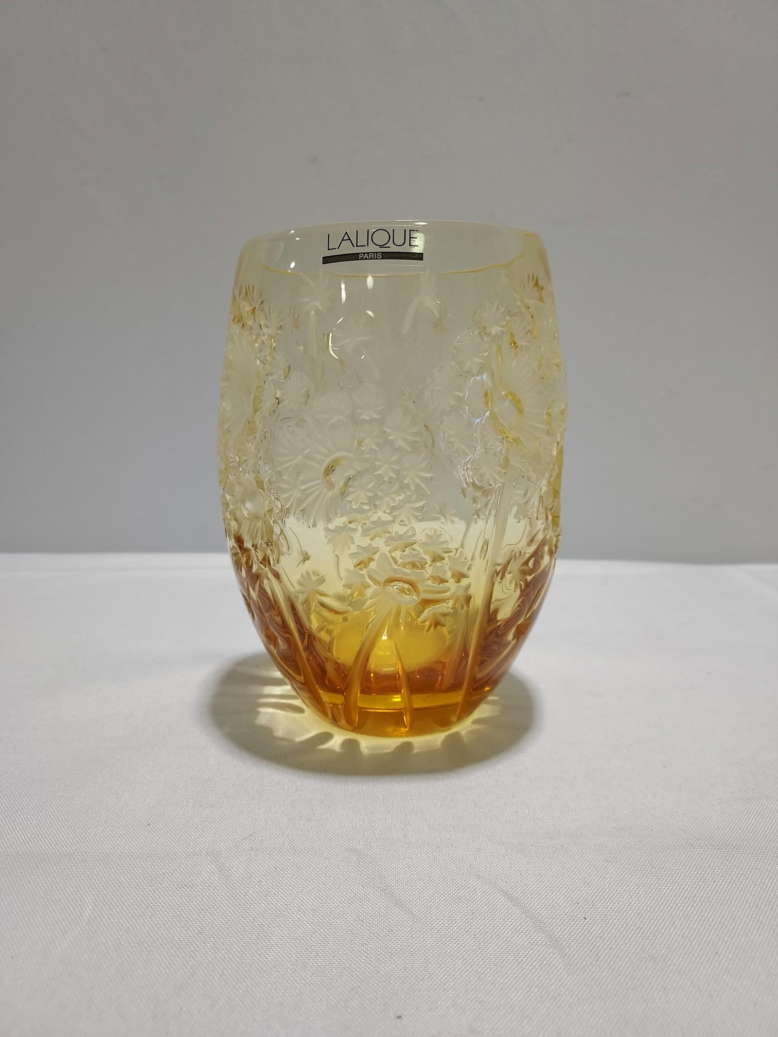 H914 Lalique Bucolique Vase: Lalique Bucolique Vase, soft graduated amber glass. Discontinued. 1st quarter 21st C. 7" x 5.5"