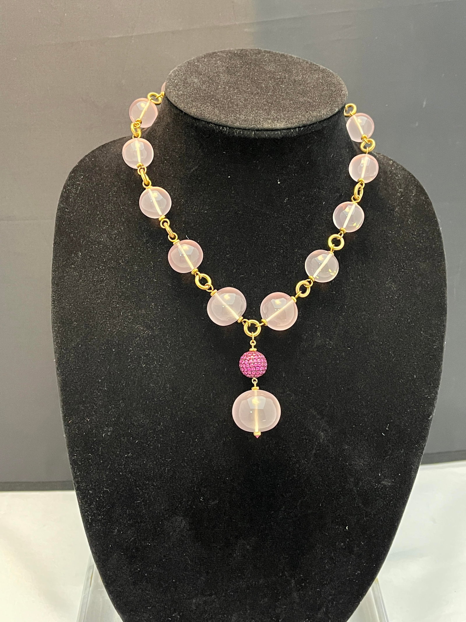 HJ294 Rose quartz & pink sapphire bead necklace: Rose quartz & pink sapphire bead necklace: one pave pink sapphire bead, one pave pink sapphire bead clasp and 15 rose quartz beads. Gold plated silver.