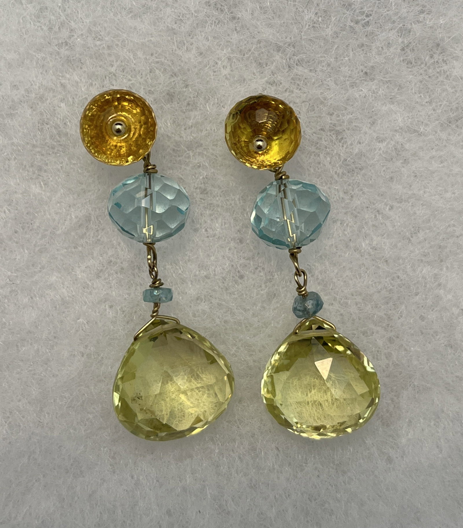 HJ171 Yellow gold citrine & blue topaz earrings: Yellow gold citrine & blue topaz drop earrings: stones are faceted. Weight 9.2 grams. Approx. 1.6" long