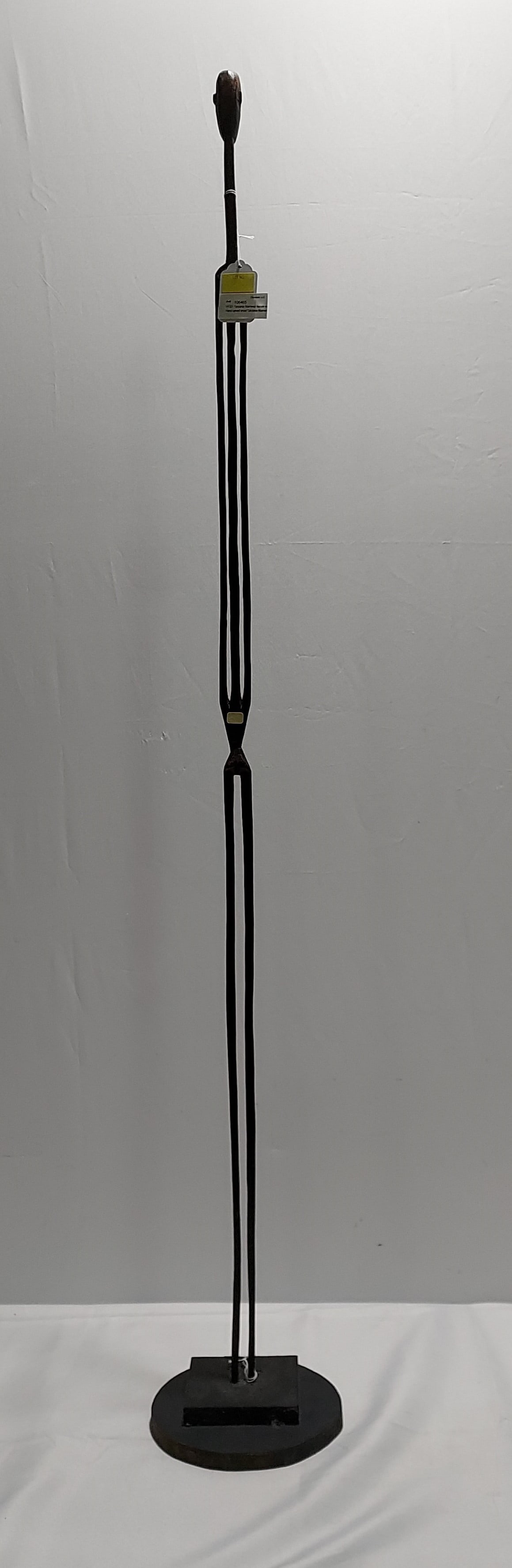 H1321 Tanzania Niamwezi female wooden stick figure: Hand carved wood Tanzania Niamwezi female stick figure. 60" x 8.5".