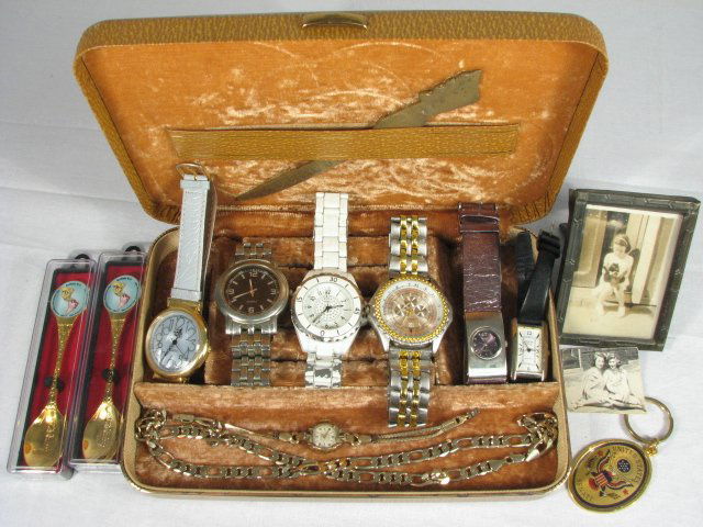 WATCHES, DECORATIVES & COLLECTABLES, ETC.: Lot of assorted watches, decoratives, collectables and more. Includes (7) various wrist watches (mens and womans), two collectable "Buffalo NY" spoons, a "United States Senate" keychain, a letter open