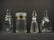 FOUR CONTEMPORARY GLASS PERFUME BOTTLES