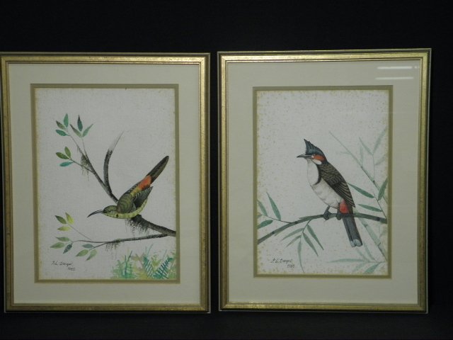 TWO P. L. DANGOL GOUACHE ON PAPER AVIARY STUDIES: Lot of two framed Nepalese aviary study paintings by P. L. Dangol. Gouache on paper, both are signed and dated lower left "P.L. Dangol. 1985". Framed, matted, and under glass in gold tone frames. Cond