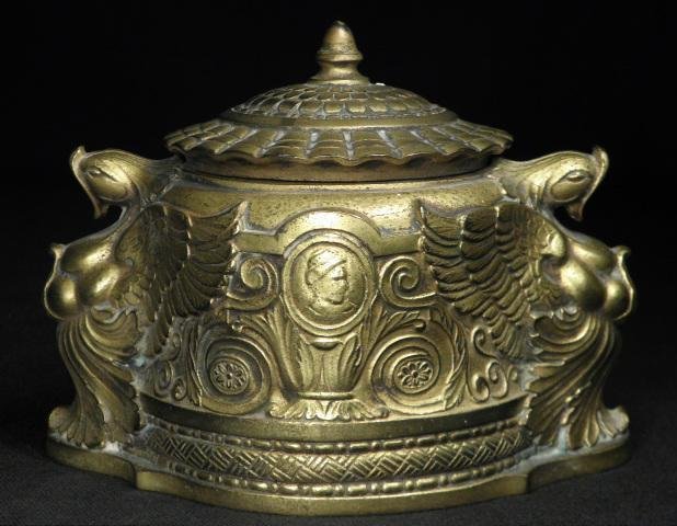 TIFFANY STUDIOS "SPANISH" GILT BRONZE INKWELL: Tiffany Studios gilt bronze inkwell in the "Spanish" pattern, circa 1920. Stamped on side of base "Tiffany Studios 1883". Includes what appears to be original glass insert. Condition: base plate appea