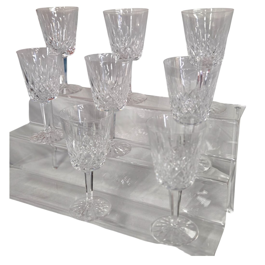 8 WATERFORD LISMORE RED WINE CRYSTAL STEMS: 8 Waterford Lismore red wine crystal stems. All with Waterford etched mark. Measures 7" H x 3.5"W. Good condition.