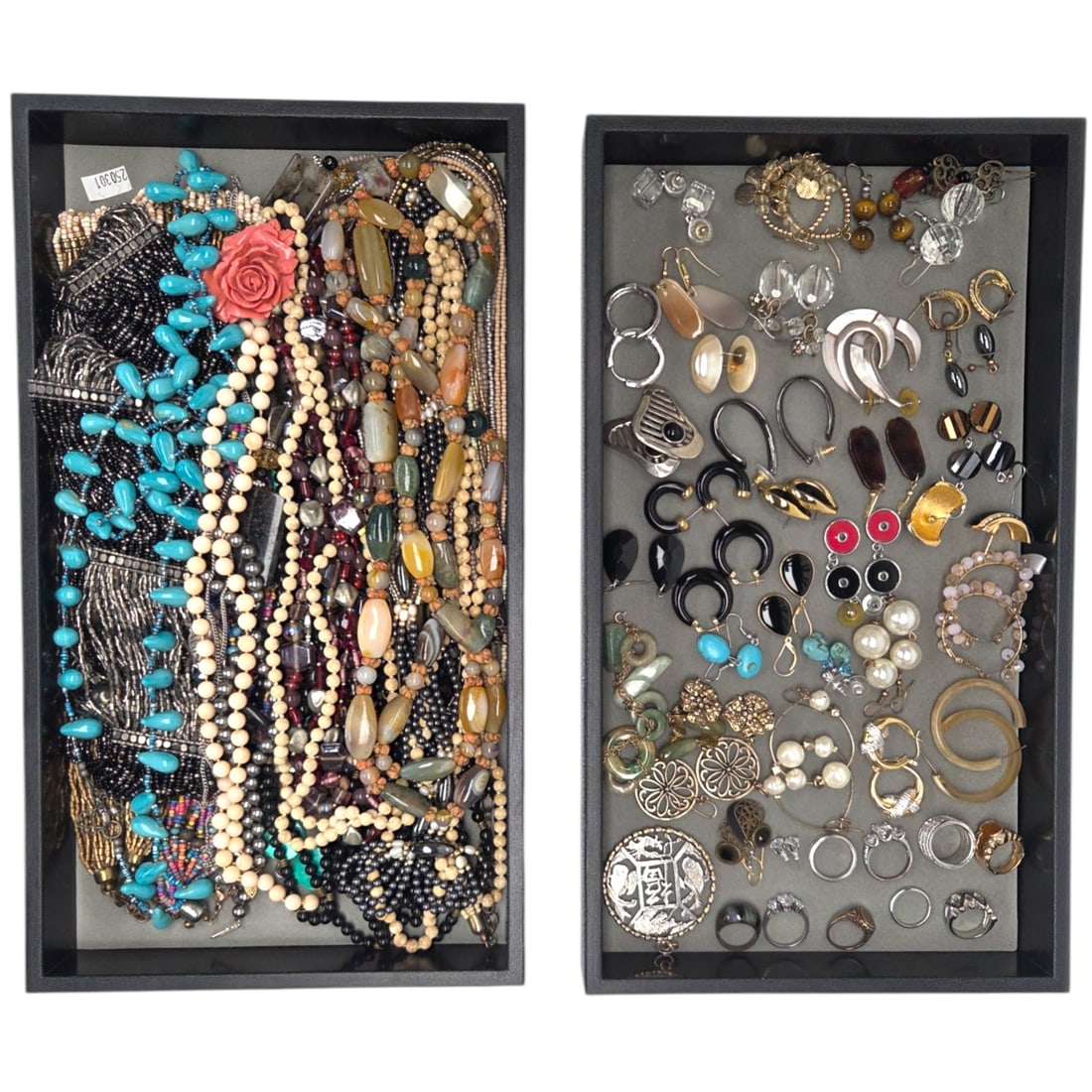 60+ PC TRAY LOT OF COSTUME JEWELRY: Approx. 60 pieces of jewelry in lot consisting of: 9 rings in various sizes, 1 Asian inspired pendent, 1 bracelet, 35 pairs of pierced earrings ( no clips), 18 beaded necklaces in various lengths. All
