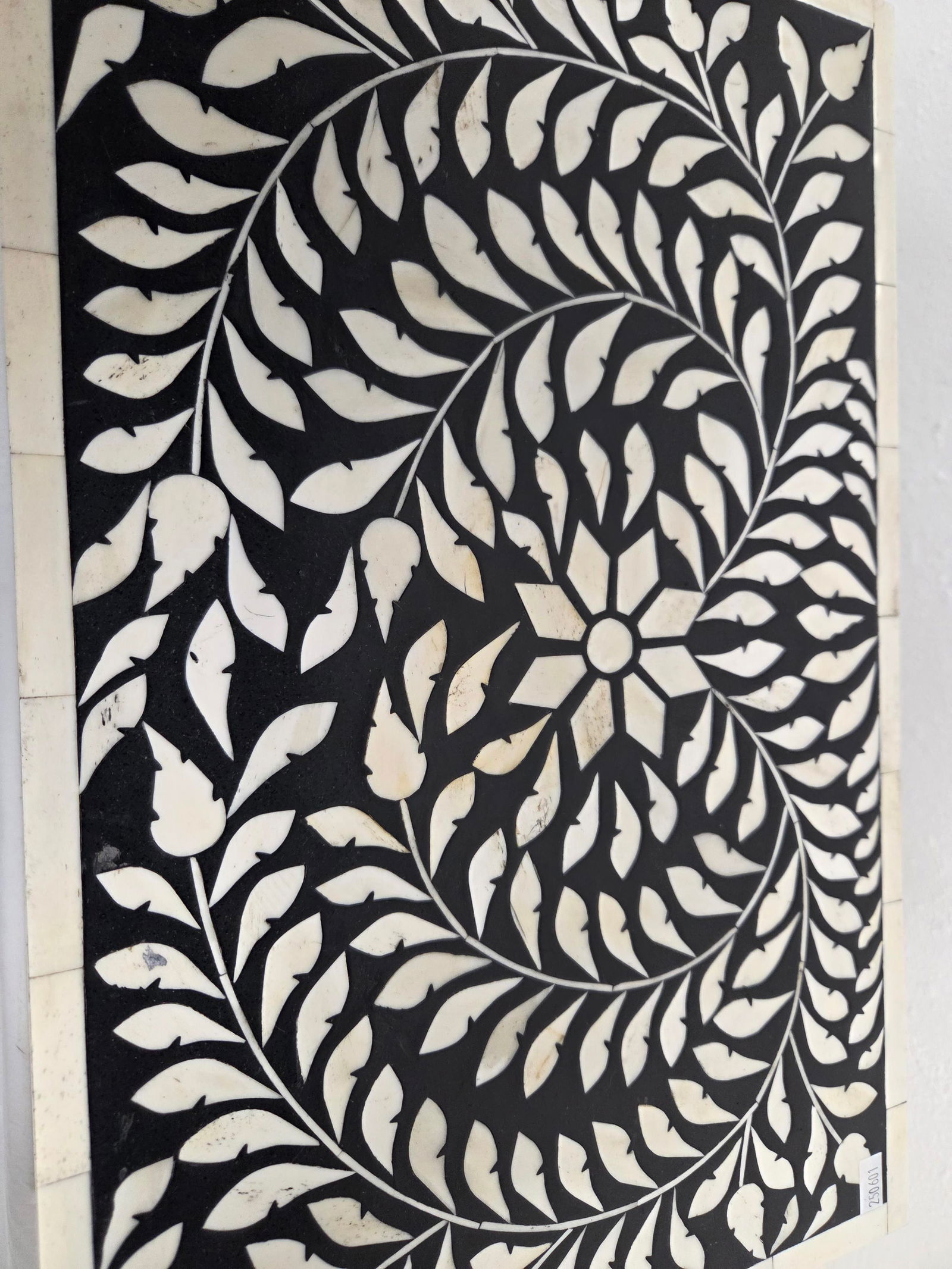 WHITE & BLACK BONE INLAY STORAGE BOX: White and black decorative inlay storage box with fitted black painted wood stand. Box measures: 7" H x 17" W x 11" D. Minor scratches and discoloration due to age and use.