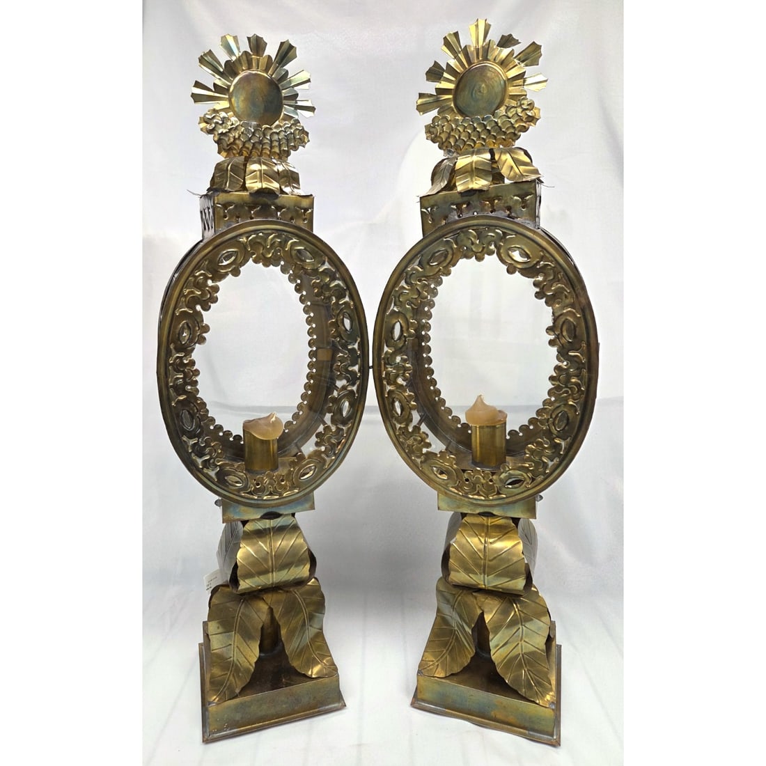 BAROQUE MEXICAN TIN LANTERN SET OF 2: Baroque Mexican tin lantern set of two. Made by Antigua de Mexico. Measuring 30"H x 9" W x 6.5"D. Good condition with some cracked glass, but still intact. Slight wear on tin due to age and use.