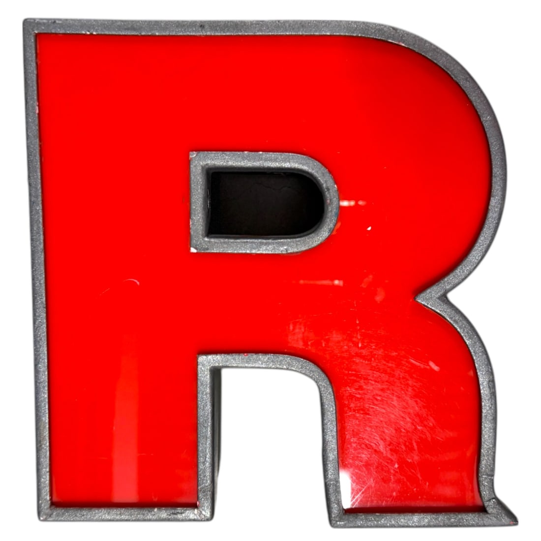 VINTAGE INDUSTRIAL METAL ENAMEL SIGN - LETTER "R": A vintage industrial metal and enamel sign of the letter, "R". 9" x 9" x 3.5".