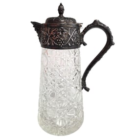 CUT CRYSTAL WATER PITCHER WITH SILVER PLATED RIM