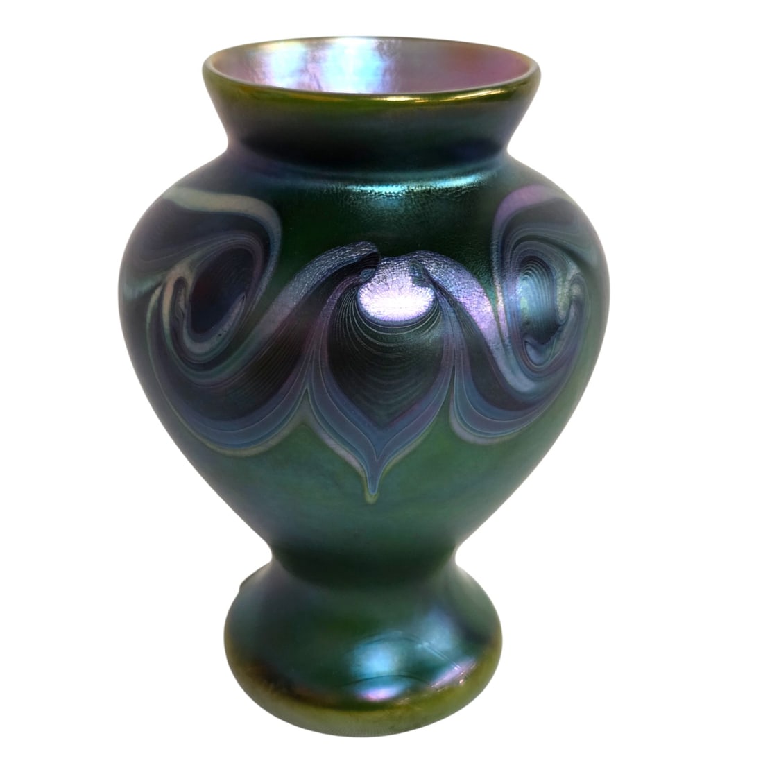 GREEN ORIENT & FLUME ART GLASS VASE: Iridescent green art glass vase with purple and black swirl design. Visible interior is gold iridescent. Signed Orient & Flume 1975. Vase measures 6". Condition is good.SHIPPING NOTELive Auctioneers o