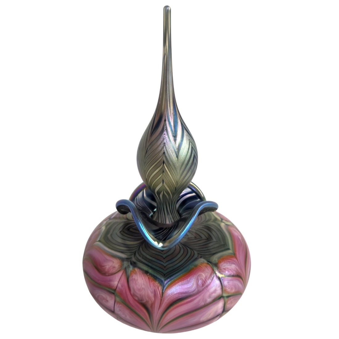 DANIEL LOTTON ART GLASS PERFUME BOTTLE: Daniel Lotton art glass perfume bottle. Iridescent blue and green above a pink and green pink pulled feather base. The stopper is an iridescent blue pulled feather and measures 7.5". The base is 3.5"