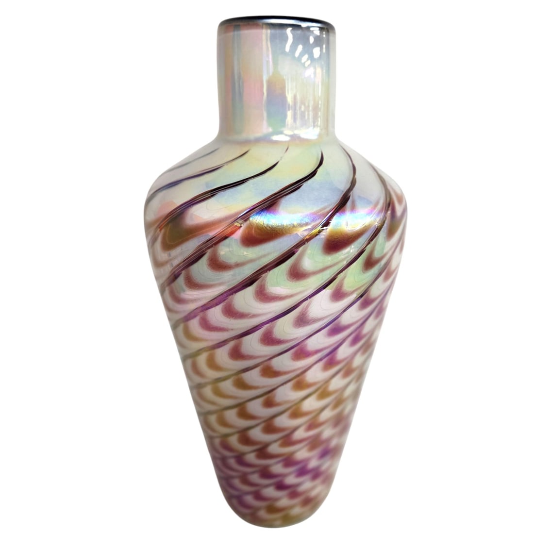 THE GLASS EYE PULLED FEATHER 1980S IRIDESCENT VASE: A large iridescent art glass vase by The Glass Eye. Deep purple and pink pulled feather and swirl design on a white ground with an all over iridescent pink, yellow, and blue glaze. Condition: one