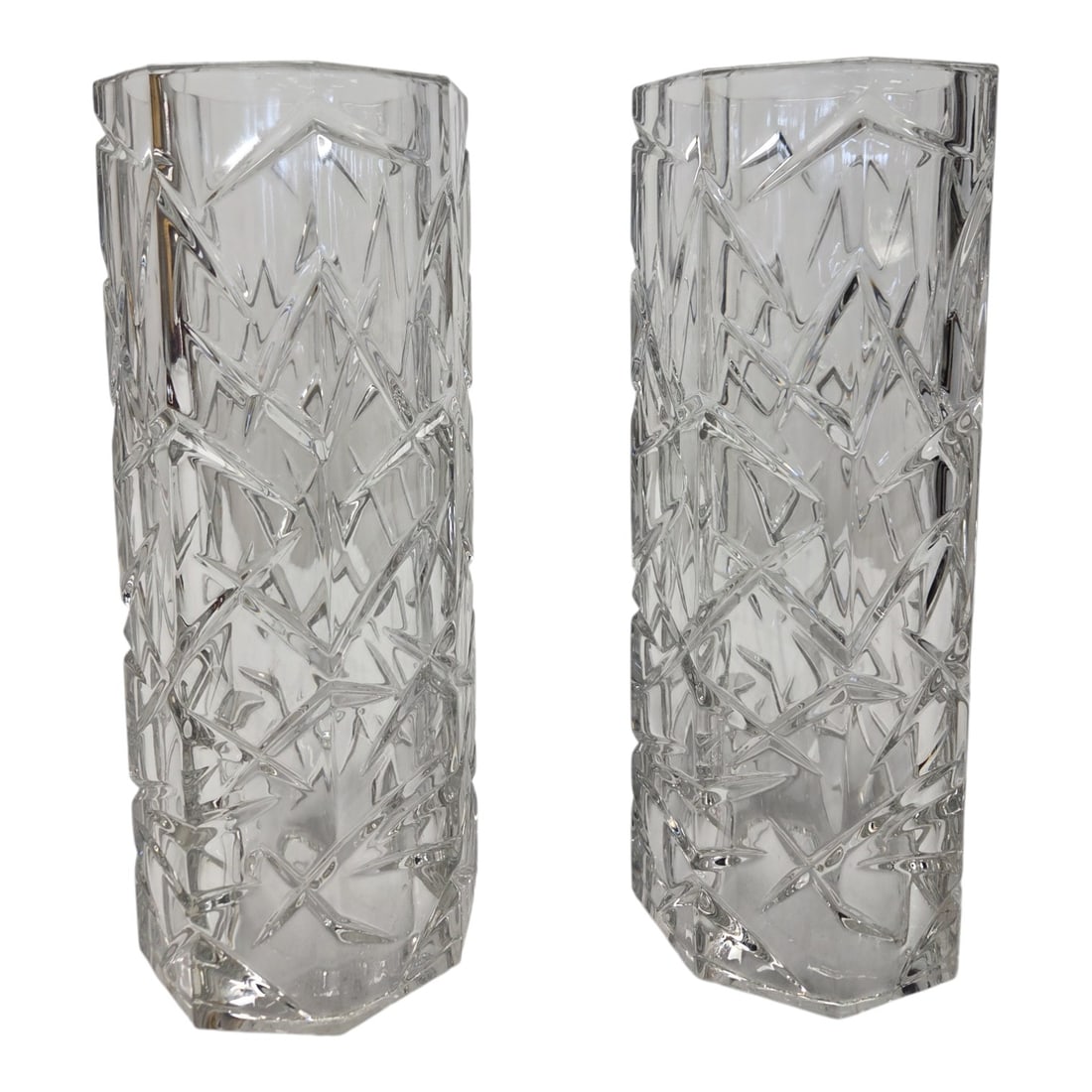 2 CRYSTAL GLASS HURRICANE CYLINDERS: Two crystal glass hurricane cylinders. Both measure 11" H x 4.25" W. No stamps or makers mark on bottom. Good condition. SHIPPING NOTE: Live Auctioneers offers a very convenient shipping option. For