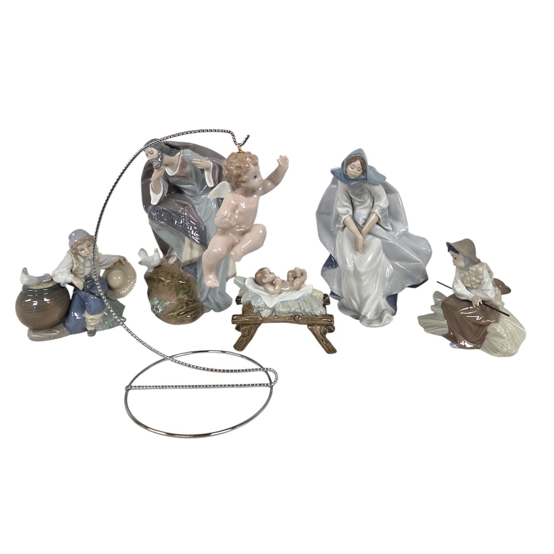 4 PC LLADRO NATIVITY SET WITH HOLY FAMILY: Lladro porcelain Nativity scene with Holy Family, shepherds, and animals. All pieces are in good condition-no chips, cracks, or visible repair. All are stamped on bottom. Largest measures 9.25"H x 6".
