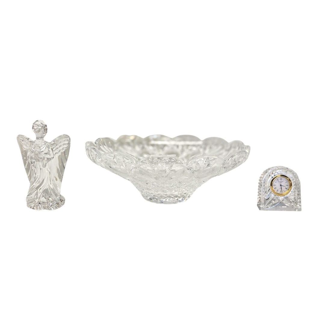 3 PC WATERFORD GLASS - BOWL, ANGEL, CLOCK: Three piece Waterford glass lot consisting of: bowl measuring 4"H x 12"W ; clock measuring 3" H x 2.75"W x 1.5" D; guardian angel measuring 6"H x 4"W x 3"D. All 3 in good condition. Etched Waterford