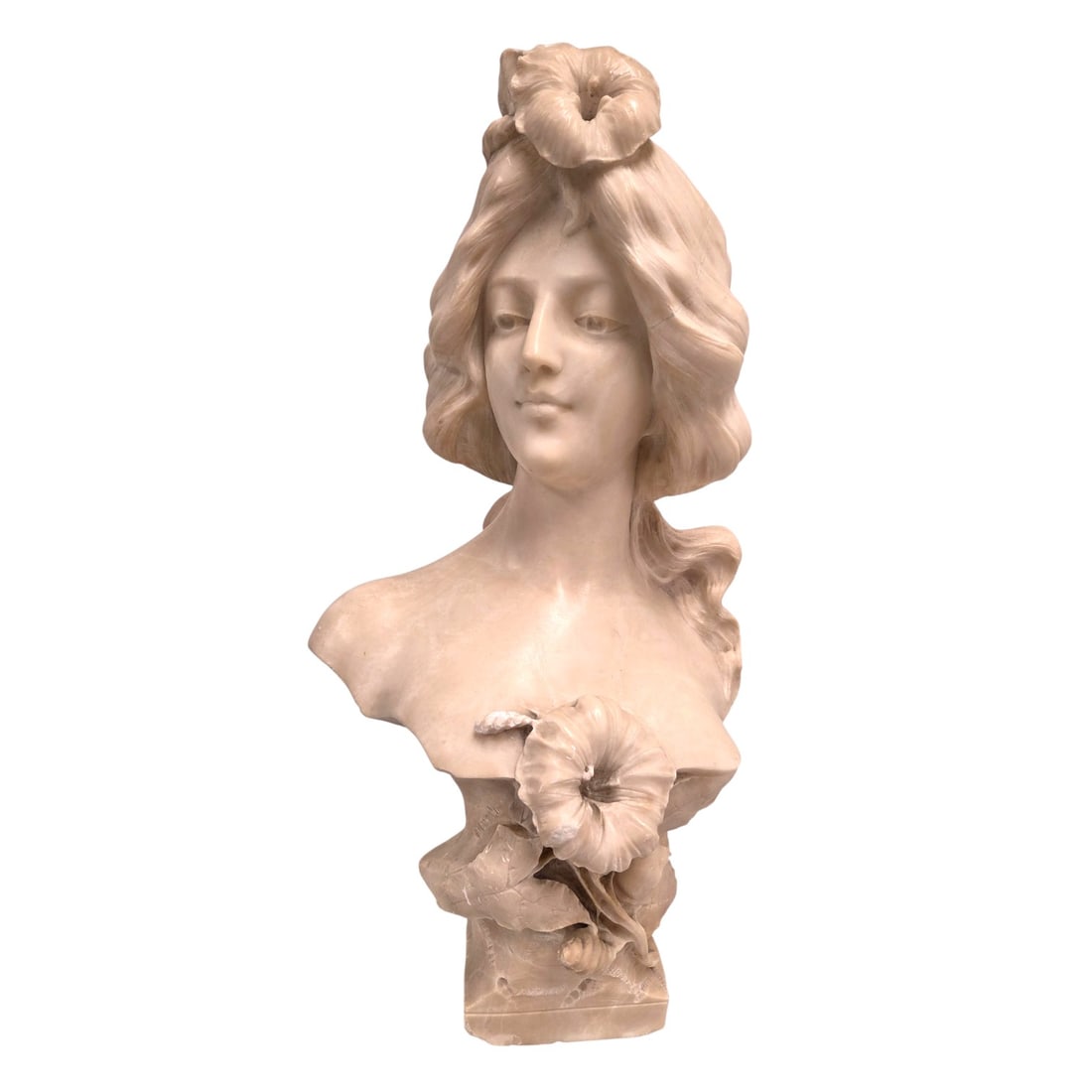 ALABASTER BUST OF A WOMAN W/ PEDESTAL: Carved Alabaster Bust of a Woman with signature on back. Minor scrapes and small chips due to age and handling. Measures 23"H x 13.5 W" Stand measures 39"H x 9.5"W. Total Height together 62". 