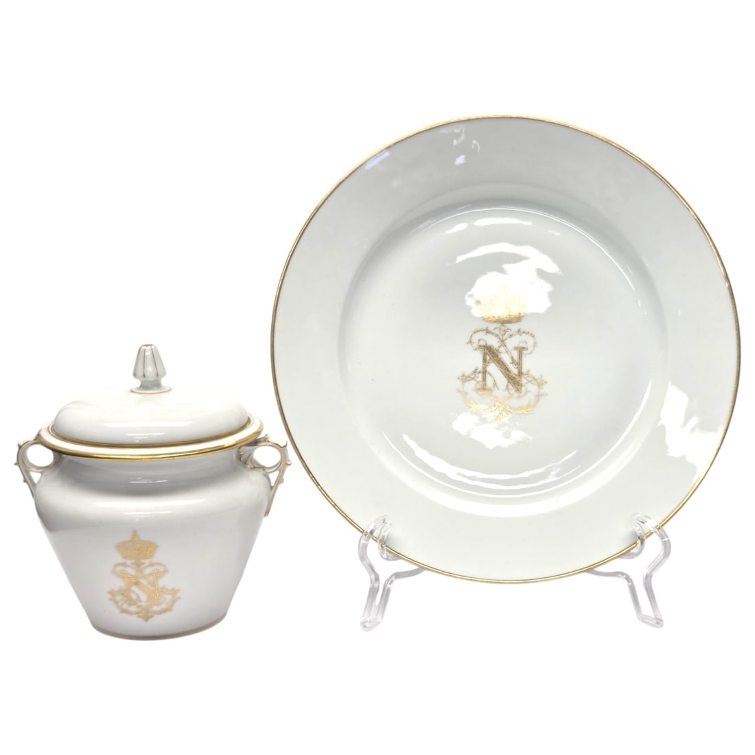 2 PC SEVRES NEOPOLEON III JAR AND PLATE: A rare antique French porcelain set featuring a Sevres Napoleon III Service Des Bals plate and a two-handled covered jar, possibly a sugar jar. The 9 3/8 inch plate is elegantly decorated with a gold