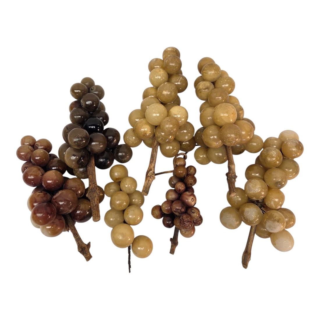 7 PIECE COLLECTION ALABASTER GRAPES: 7 piece grouping of carved alabaster grapes. Collection includes 5 larger grapes sets, and 2 smaller grape sets, in a variety of neutral earth tones . See photos. Each Large grape measure