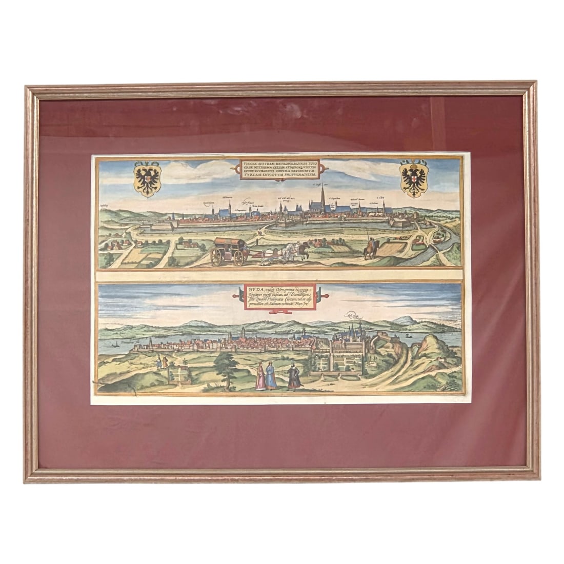 COPPERPLATE ENGRAVING OF VIENNA AND BUDAPEST: Copperplate engraved hand colored map of Vienna and Budapest, 1572. Published by Braun & Hogenberg. Site size 12.5" H x 19"W. Outside size 21"H x 26" W .Single 3.25" rag mat under glass with 1"