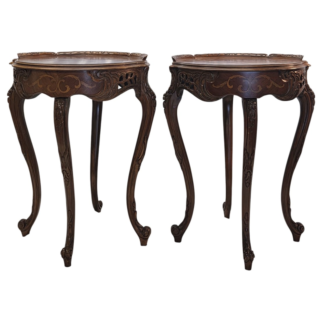 PR OF FRENCH STYLE CARVED WOOD INLAY SIDE TABLES: Two round French carved wood and decorative floral inlay side tables. Both measure 28"H x 19" W. Some wear on top due to use. See photos. SHIPPING NOTE: Live Auctioneers offers a very convenient shipp