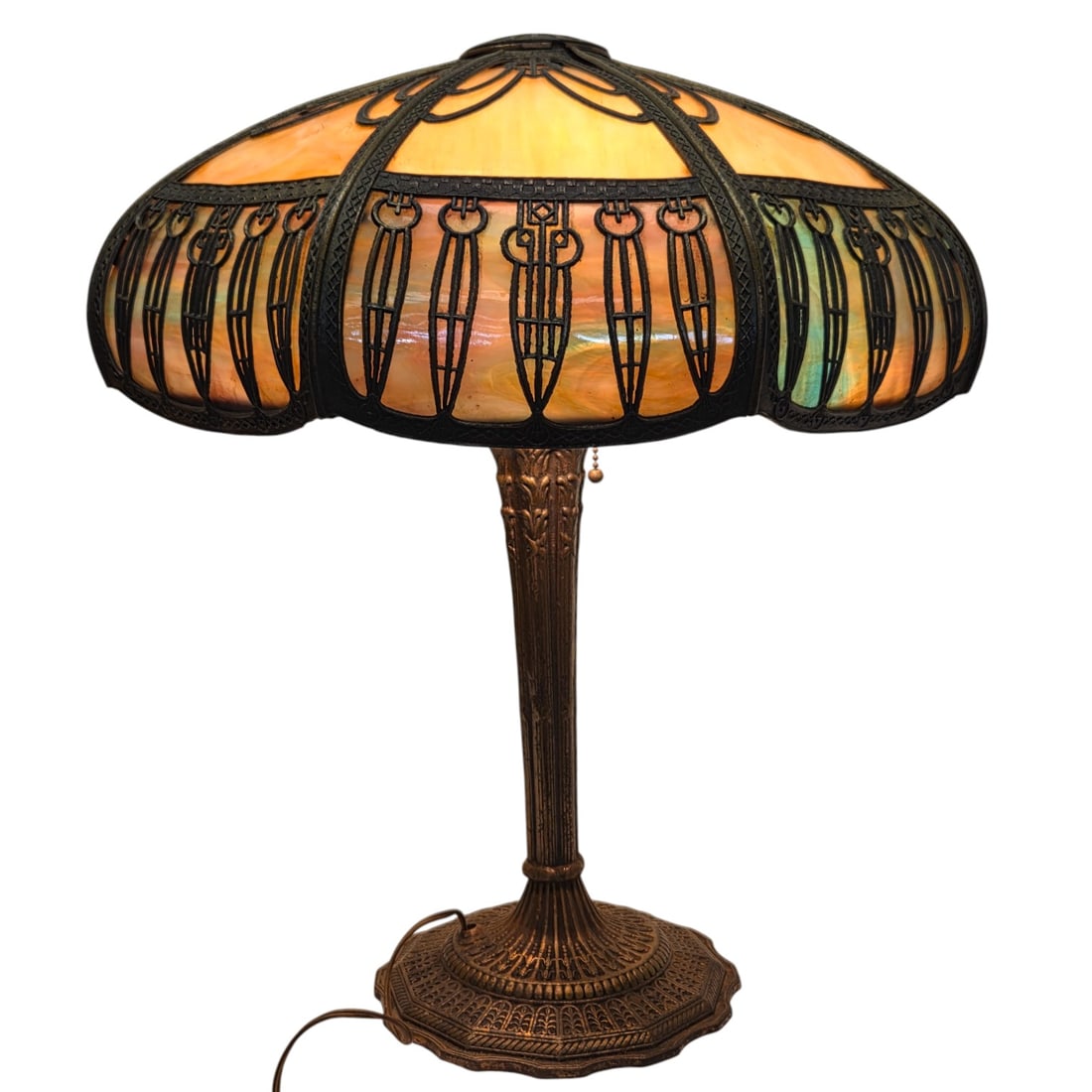 ANTIQUE SLAG GLASS TABLE LAMP W/ METAL OVERLAY: Antique slag glass table lamp with ornate metal overlay shade. Popular during late 19th and early 20th century particularly during the Victorian and Art Nouveau eras. Measures 23"H x 18.5". Shade meas